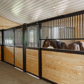 A horse standing in a stall