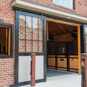 A nicely finished horse barn exterior