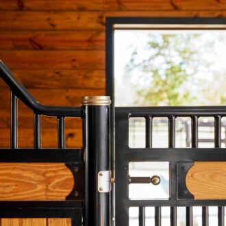 High-quality sliding stall doors with protective stall grills, wood and metal finish, open window view