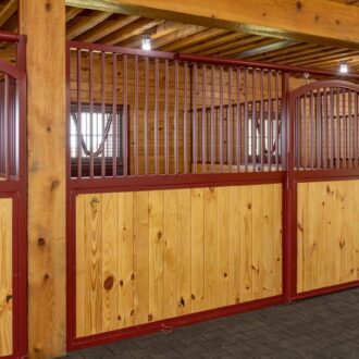A horse stall with a sliding door