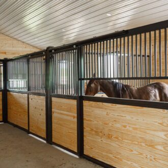 A horse relaxing in a stall