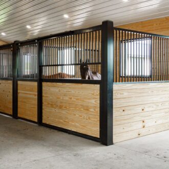 Horse stalls with sliding stall fronts