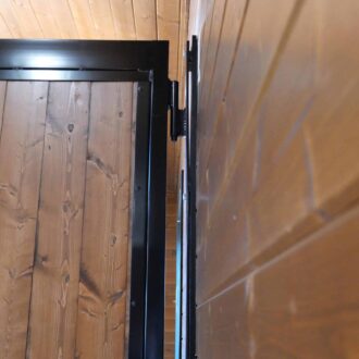 A horse stall door hinge