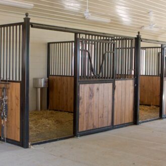 Open horse stalls with partitions