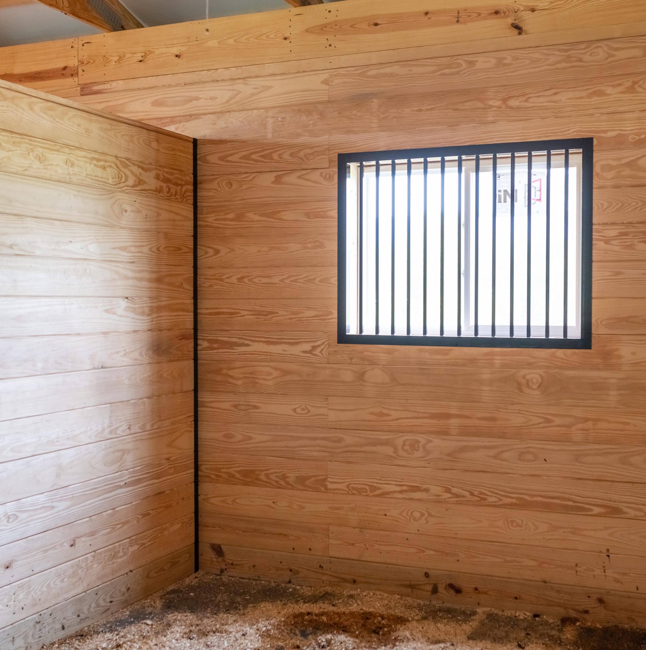 A horse stall made with beautiful Tongue & Groove Lumber.